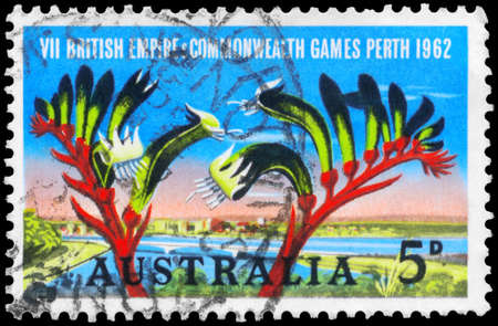 AUSTRALIA - CIRCA 1962: A Stamp printed in AUSTRALIA shows the View of Perth and Kangaroo Paw, circa 1962のeditorial素材