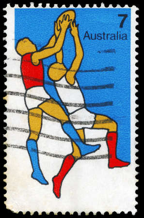 AUSTRALIA - CIRCA 1974: A Stamp printed in AUSTRALIA shows the Australian Football, Sport series, circa 1974のeditorial素材