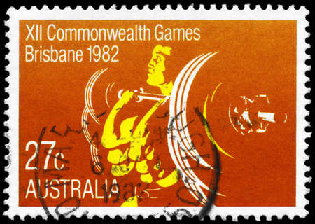 AUSTRALIA - CIRCA 1982: A Stamp printed in AUSTRALIA shows the Weightlifting, 12th Commonwealth Games, Brisbane, series, circa 1982のeditorial素材