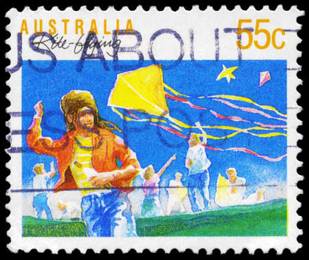 AUSTRALIA - CIRCA 1989: A Stamp printed in AUSTRALIA shows the Kiteflying, Sports series, circa 1989のeditorial素材