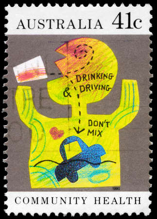 AUSTRALIA - CIRCA 1990: A Stamp printed in AUSTRALIA shows the Caricature "Drinking and Driving do not mix", Community health series, circa 1990のeditorial素材