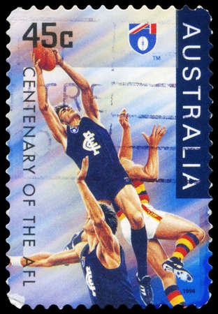 AUSTRALIA - CIRCA 1996: A Stamp printed in AUSTRALIA shows the Carlton Blues, Centenary of the AFL series, circa 1996のeditorial素材