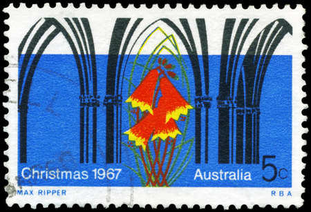 AUSTRALIA - CIRCA 1967: A Stamp printed in AUSTRALIA shows the Gothic Arches and Christmas Bell Flower, Christmas issue, circa 1967のeditorial素材