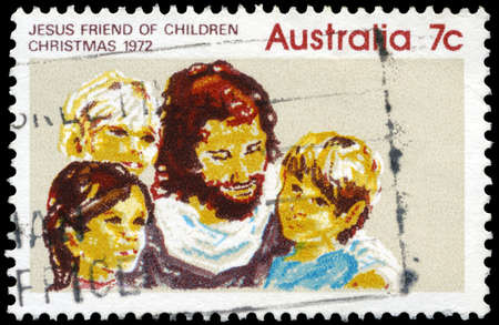 AUSTRALIA - CIRCA 1972: A Stamp printed in AUSTRALIA shows the Jesus and Children, Christmas issue, circa 1972のeditorial素材