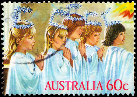 AUSTRALIA - CIRCA 1986: A Stamp printed in AUSTRALIA shows the Kindergarten Nativity play, "Angels", Christmas series, circa 1986のeditorial素材