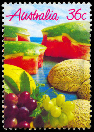 AUSTRALIA - CIRCA 1987: A Stamp printed in AUSTRALIA shows the Melons and Grapes, Fruits series, circa 1987のeditorial素材