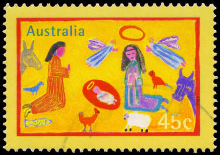 AUSTRALIA - CIRCA 1998: A Stamp printed in AUSTRALIA shows the Nativity, Children paintings, Christmas series, circa 1998のeditorial素材
