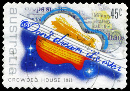 AUSTRALIA - CIRCA 2001: A Stamp printed in AUSTRALIA shows the Image for the Song "Don't Dream It's Over", by Crowded House (1986), Rock Music series, circa 2001のeditorial素材