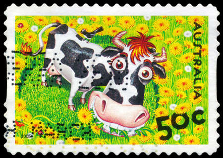 AUSTRALIA - CIRCA 2005: A Stamp printed in AUSTRALIA shows the Cow and Bird, Down on the Farm series, circa 2005のeditorial素材