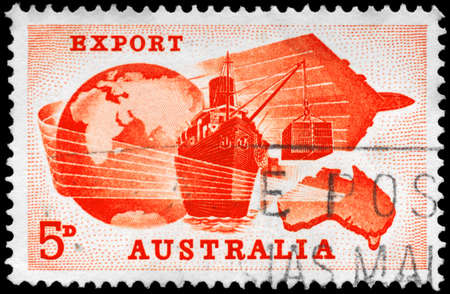 AUSTRALIA - CIRCA 1963: A Stamp printed in AUSTRALIA shows the Globe, Ship, Plane and Map, Importance of exports to Australian economy, circa 1963の写真素材