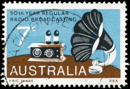 AUSTRALIA - CIRCA 1973: A Stamp printed in AUSTRALIA shows the Radio and Gramophone Speaker, Broadcasting in Australia, 50th annivesary, circa 1973の写真素材