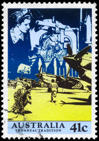 AUSTRALIA - CIRCA 1990: A Stamp printed in AUSTRALIA shows the Women working in Factories, Aircraft at the ready, Scenes from WW II, ANZAC series, circa 1990のeditorial素材