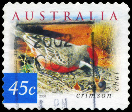 AUSTRALIA - CIRCA 2001: A Stamp printed in AUSTRALIA shows the Crimson Chat, Fauna and Flora,...
