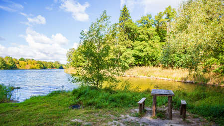 Landscape with a resting place by the lakeの写真素材