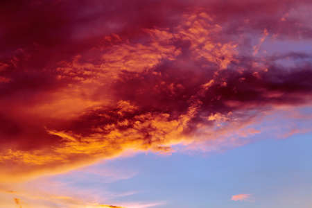 Abstract dark red clouds sky background