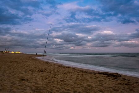 Sunset over the beach in Castelldefels, Catalonia, Spainの写真素材