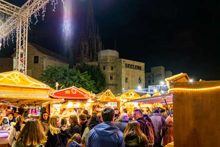 Santa Llucia christmas market at night in Barcelona, Catalonia, Spainのeditorial素材