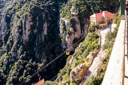 Cableway, Montserrat monastery on mountain in Barcelona, Cataloniaのeditorial素材
