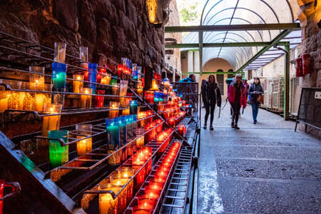 Candles in Montserrat monastery on mountain in Barcelona, Cataloniaのeditorial素材