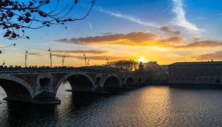Pont Neuf at sunset in Toulouse, France.の写真素材
