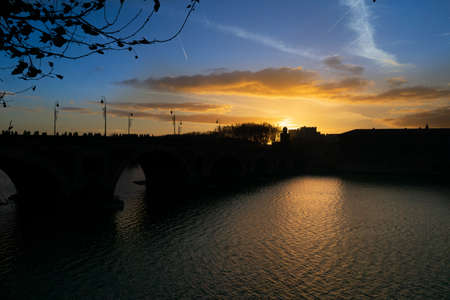 Pont Neuf at sunset in Toulouse, France.の写真素材