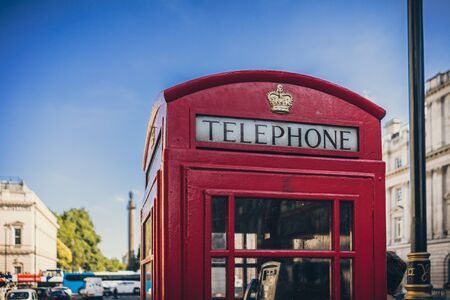 Red telephone box on neighborhood district of St. James in London, UKの写真素材