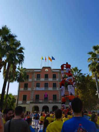 Castellers, human tower Catalonia tradition in Castelldefels, Spain.のeditorial素材