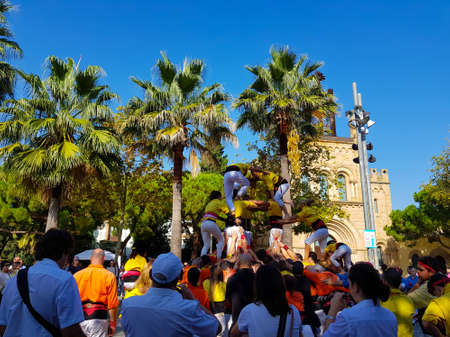 Castellers, human tower Catalonia tradition in Castelldefels, Spain.のeditorial素材