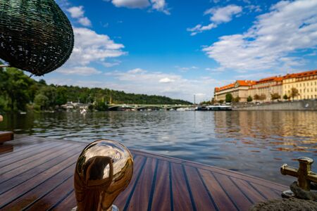 Scenic panorama cityscape view of Moldava river boat Prague in Czech Republicの写真素材