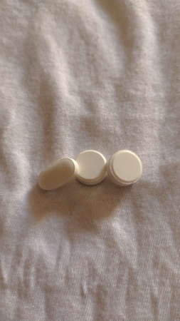 collection of various white pilsl on white background