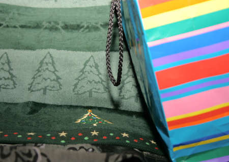christmas presents: colorful boxand green hand towel