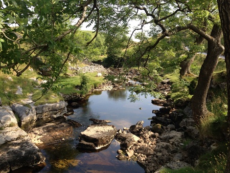 Calm water on waterfall walk in Lake District の素材