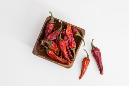 Dried Home Grown Chilli Peppers on the backgroundの写真素材