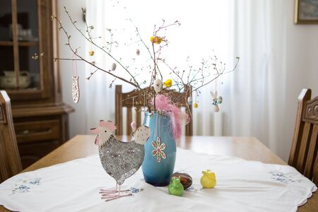 Easter decoration with eggs on the wooden background