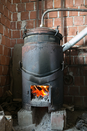 Old Fashioned way of cooking liquor for home useの写真素材