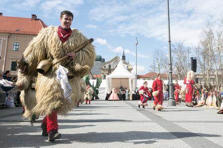 Ljubljana, Slovenia / Slovenia - FEBRUARY 02 2019: Carnival in Slovenia with some traditional Slovenian mask such as kurent, which is made out of sheep wool; it scares winter awayのeditorial素材