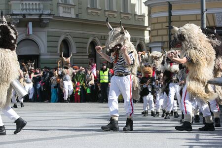 Ljubljana, Slovenia / Slovenia - FEBRUARY 02 2019: Carnival in Slovenia with some traditional Slovenian mask such as kurent, which is made out of sheep wool; it scares winter awayのeditorial素材