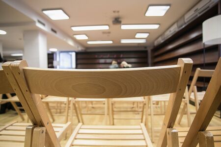 Empty chair waiting for conference to beginの写真素材