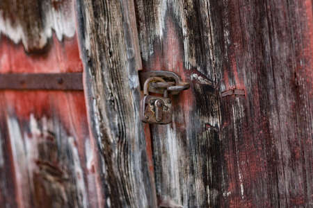 Old lock at wooden door