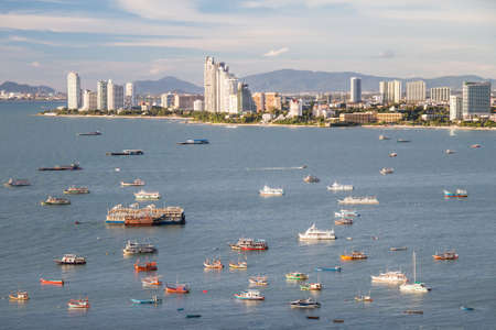 Skyline of Pattaya, Thailand with bay and boatsのeditorial素材