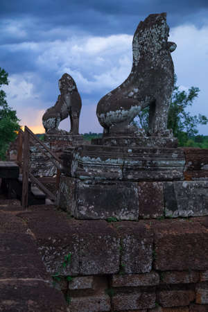 Sculptures of lions on top of Pre Rup temple around Angkor Watの写真素材