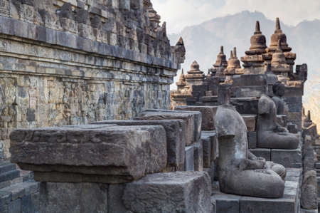 Buddha statues at the galleries of Borobudur templeの写真素材