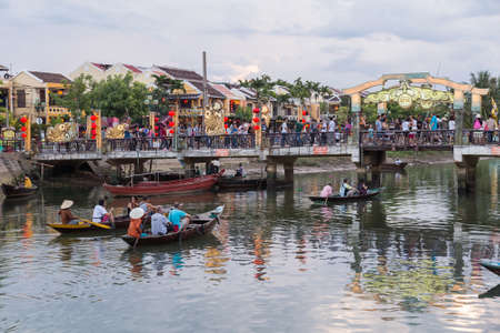HOI AN, VIETNAM - CIRCA AUGUST 2015: People walking on the streets of old town Hoi An, Vietnamのeditorial素材