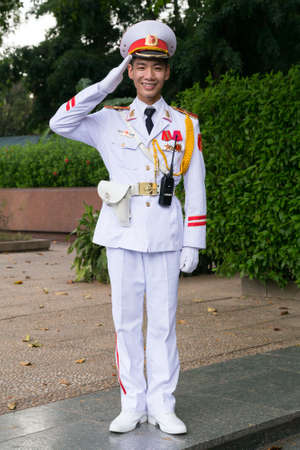 HANOI, VIETNAM - CIRCA AUGUST 2015: Vietnamese soldier salutes outside Ho Chi Minh mausoleum in Hanoiのeditorial素材