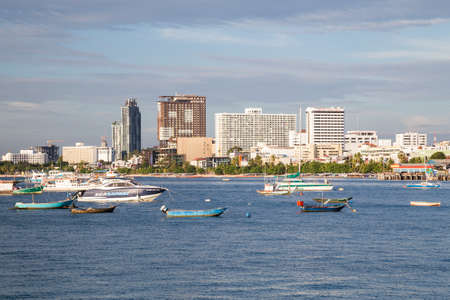 Pattaya, Thailand - 08 22 2015: Panorama of Pattaya, Thailand with bay and boats at sunsetのeditorial素材