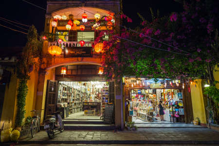 HOI AN, VIETNAM - CIRCA AUGUST 2015: People walking on the streets of old town Hoi An, Vietnam by nightのeditorial素材