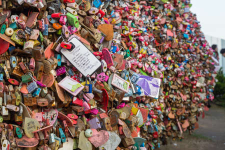 Seoul, South Korea - circa September 2015: Locks with lovers and couple names around Namsan Tower, Seoul, South Koreaのeditorial素材