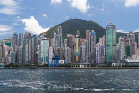 Hong Kong, SAR China - circa July 2015: Skyline of Hong Kong Downtown across Victoria Harbourのeditorial素材