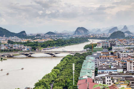 Guilin, China - circa July 2015: Panorama of Guilin and its karst mountains from Fubo hillのeditorial素材