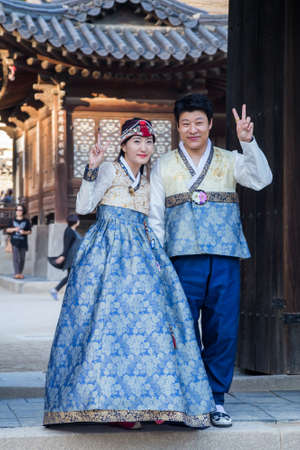 Seoul, South Korea - circa September 2015: Korean couple in traditional dresses in Changdeokgung Palace, Seoulのeditorial素材